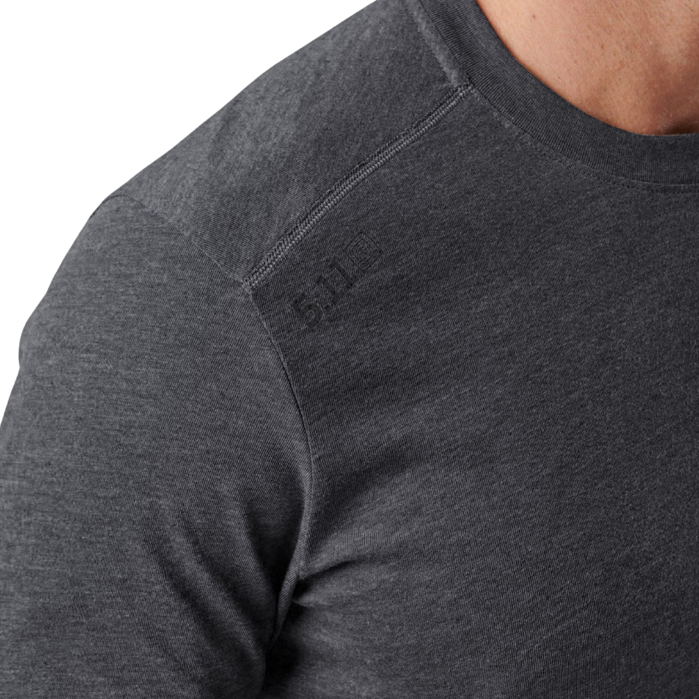 Close-up of the shoulder logo on the 5.11 Tactical PT-R Charge Long Sleeve 2.0 in Black Heather