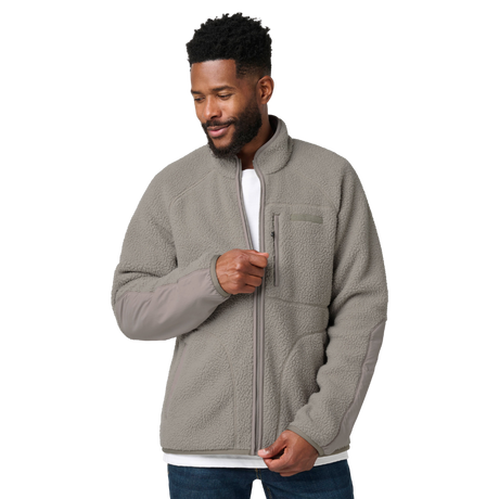 Man zipping up the 5.11 Tactical HQ Tech Fleece Jacket in Mushroom