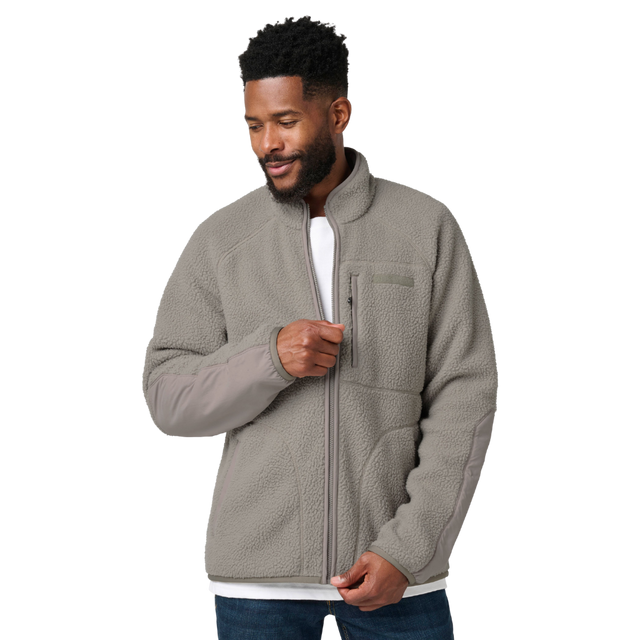 Man zipping up the 5.11 Tactical HQ Tech Fleece Jacket in Mushroom