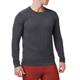 Man wearing the 5.11 Tactical PT-R Charge Long Sleeve 2.0 in Black Heather, angled front view