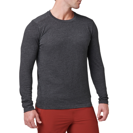 Man wearing the 5.11 Tactical PT-R Charge Long Sleeve 2.0 in Black Heather, angled front view