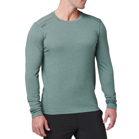 Man wearing the 5.11 Tactical PT-R Charge Long Sleeve 2.0 in Willow Green Heather, angled front view