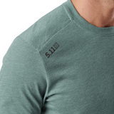 Close-up of the shoulder logo on the 5.11 Tactical PT-R Charge Long Sleeve 2.0 in Willow Green Heather