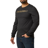 Man wearing the 5.11 Tactical Weathered Lock Up Long Sleeve Tee in Black with a distressed tan Five Eleven chest print, angled to the left